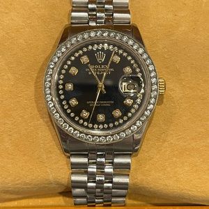 Rolex Women's Silver and Gold Watch with Black Dial